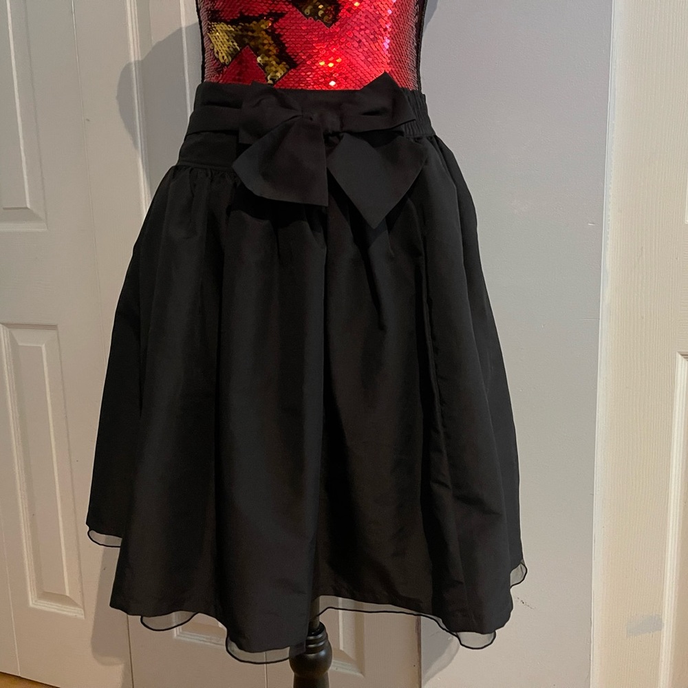 Pretty black matte satin and toole with bow skirt